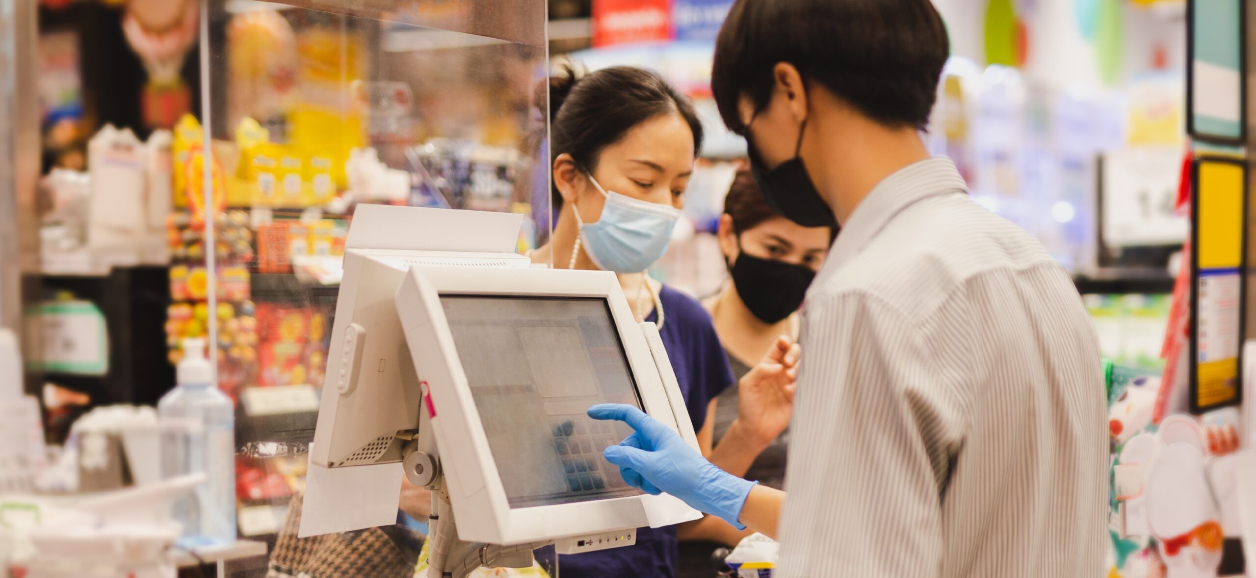 Retail cashier working pos