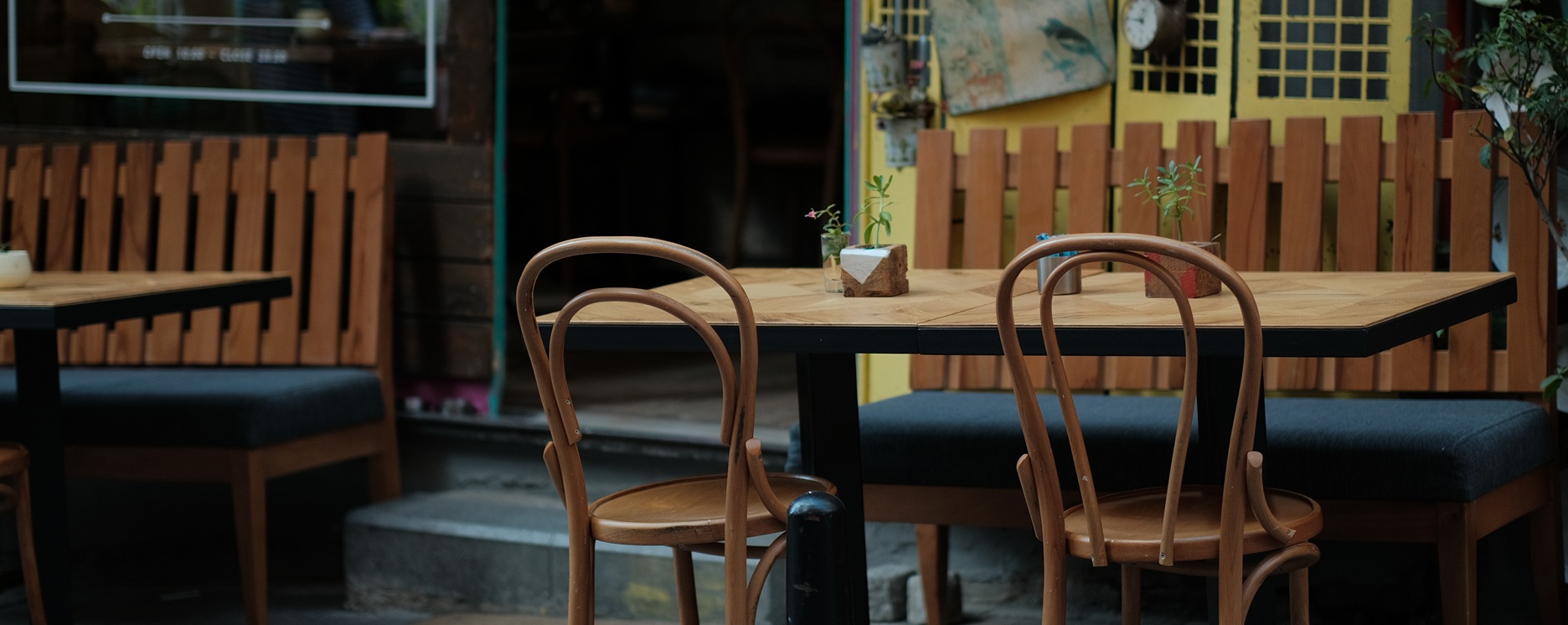 An empty set of cafe table and chairs